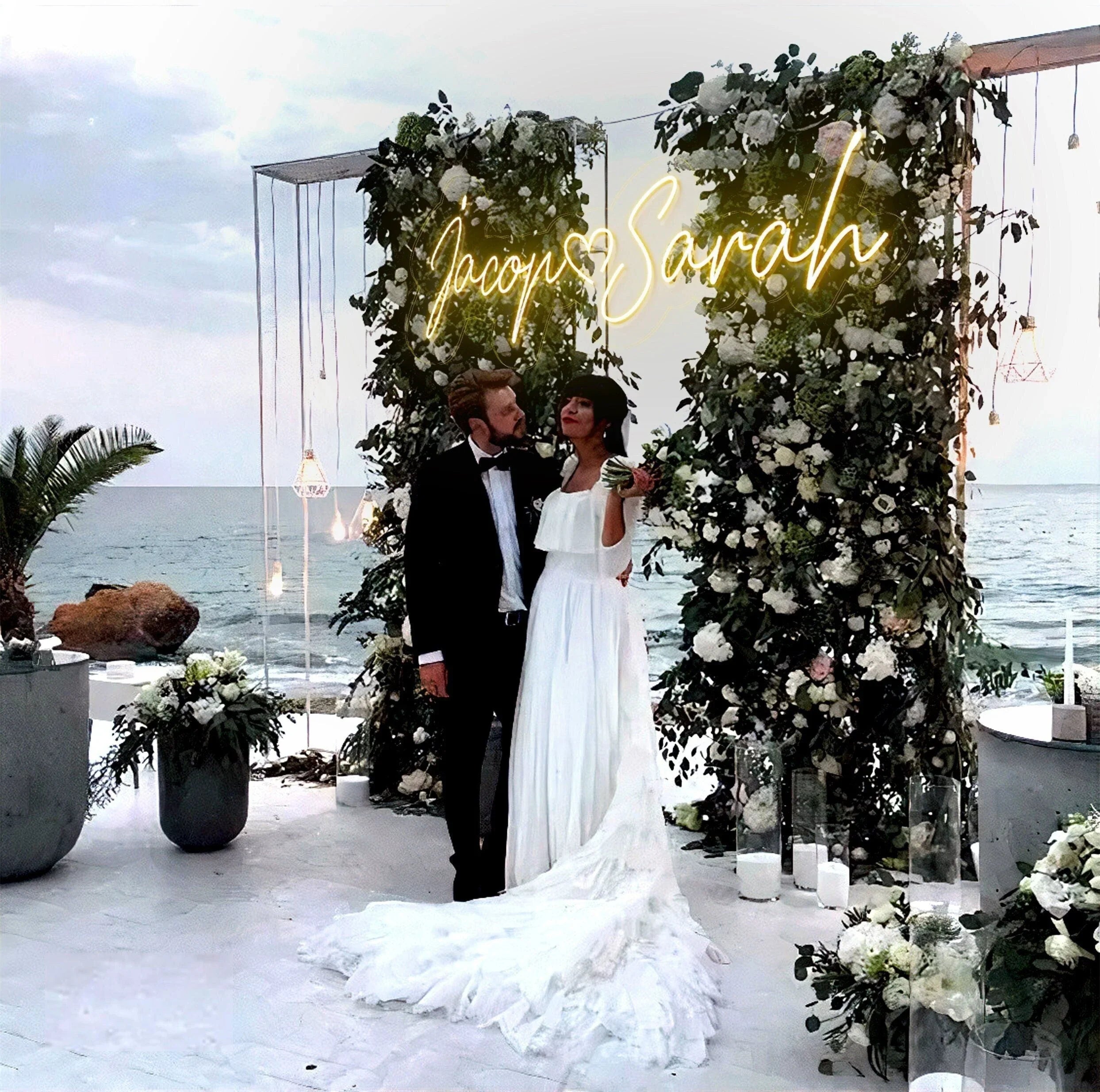 Custom wedding neon sign glowing at a reception backdrop styled for modern wedding decor