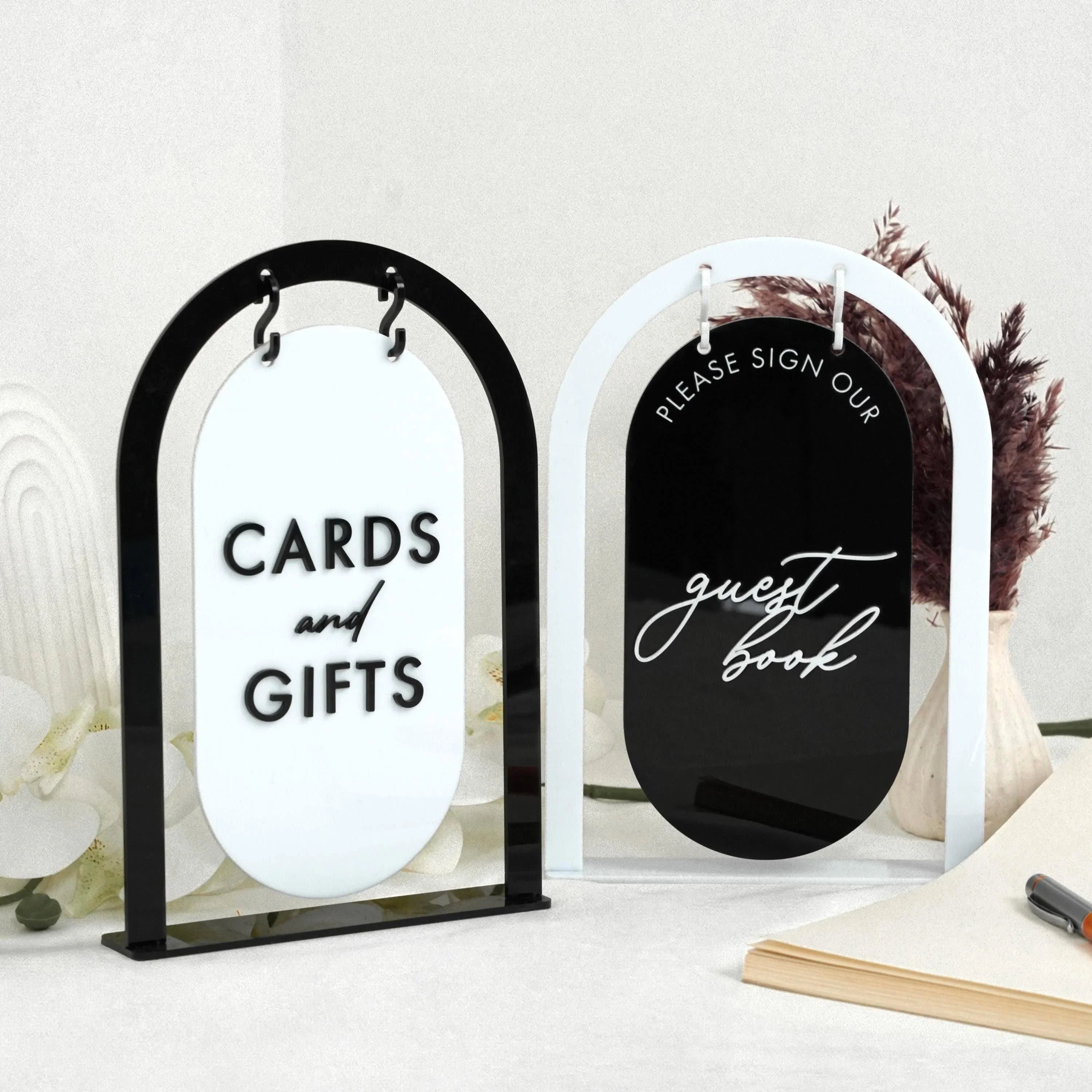 Acrylic cards and gifts sign in gold mirror finish styled on a gift table for wedding and event decor