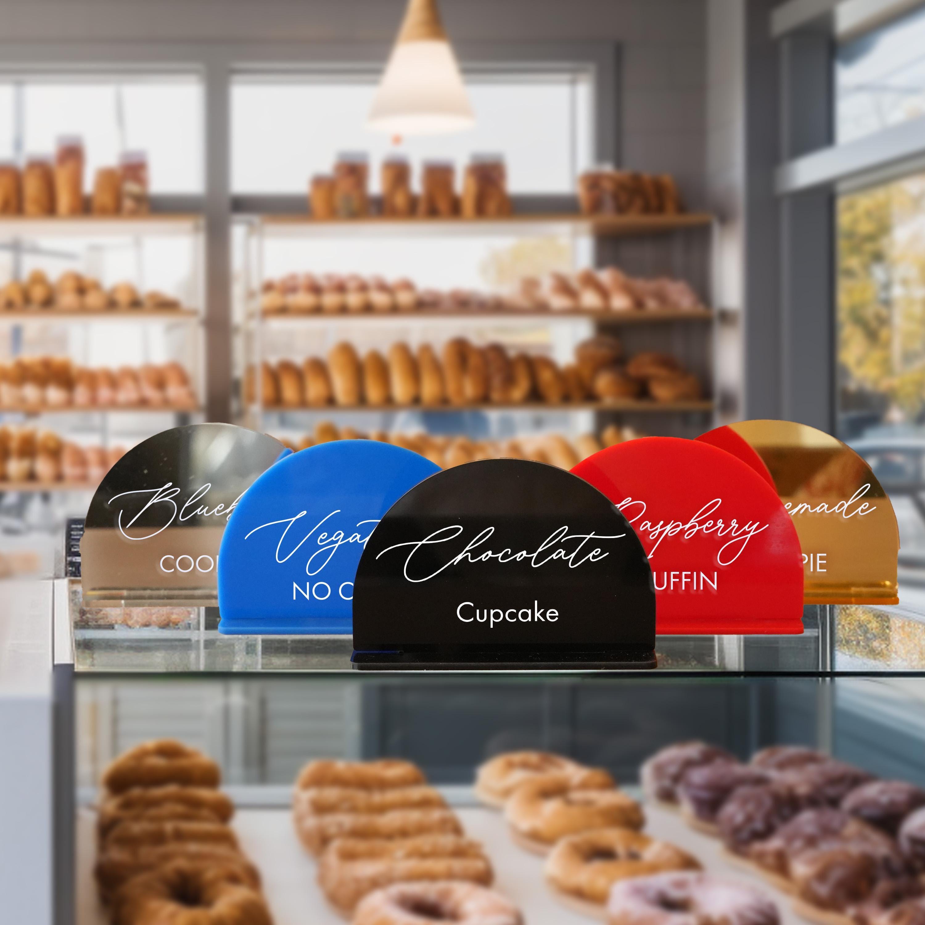 a display case filled with lots of donuts