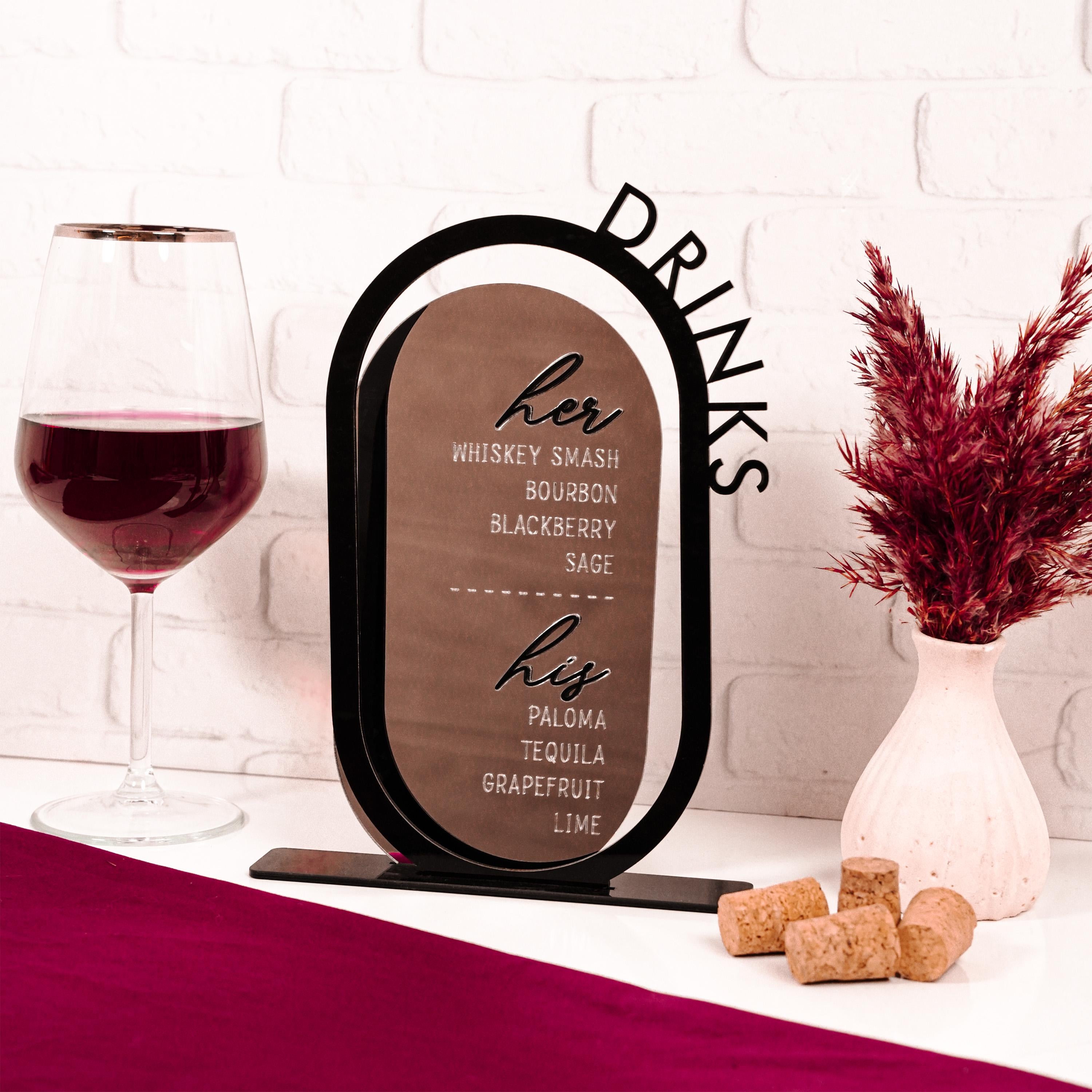 a wine glass and a wine bottle on a table