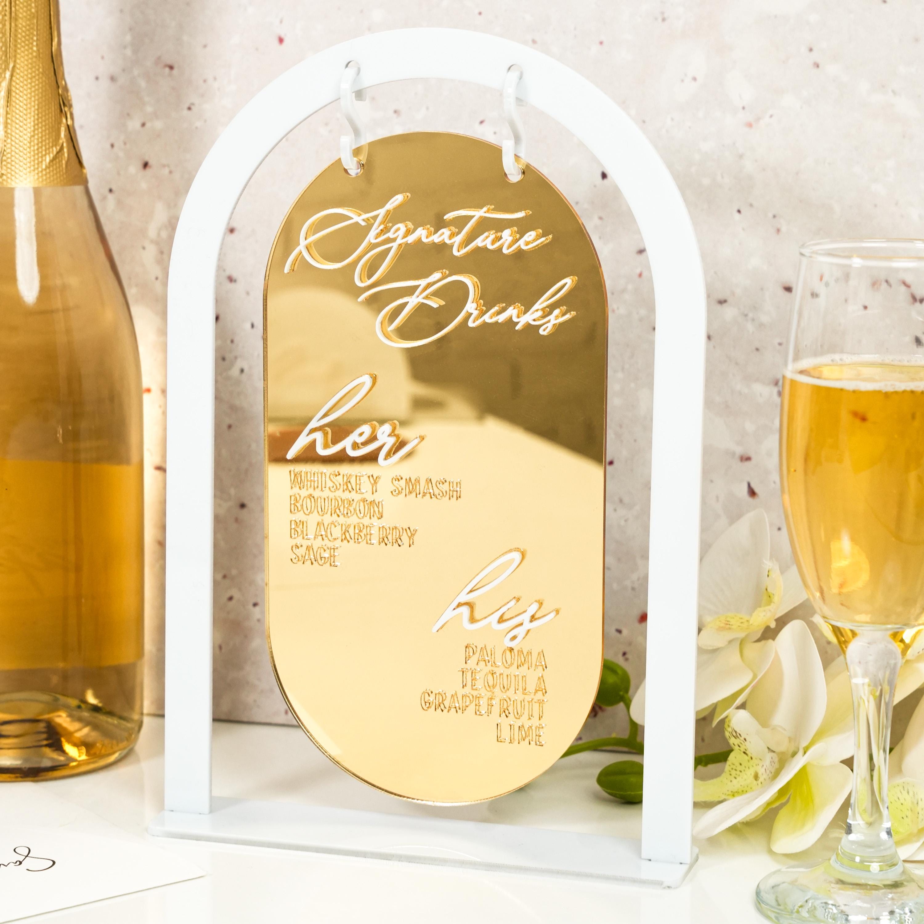 a glass of wine next to a bottle of wine