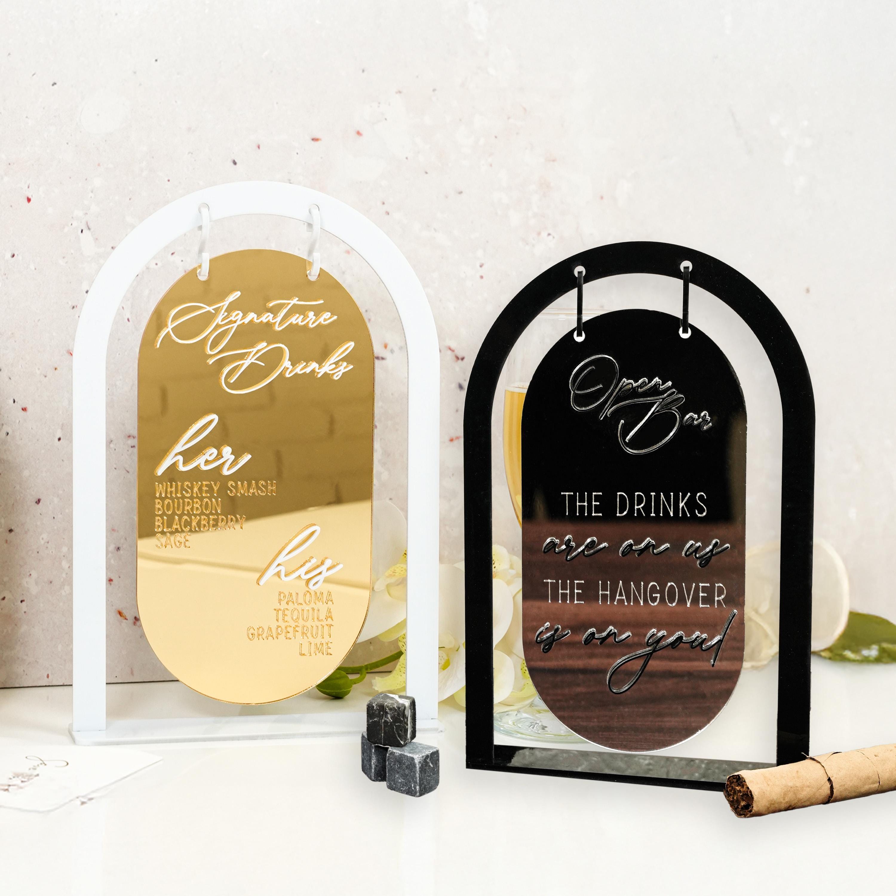 a couple of wine glasses sitting on top of a table