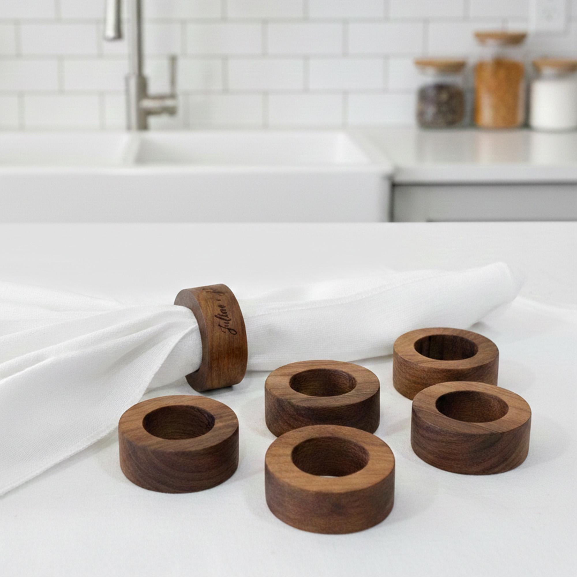 Set of personalized wooden napkin rings for wedding table decor, minimalist natural styling