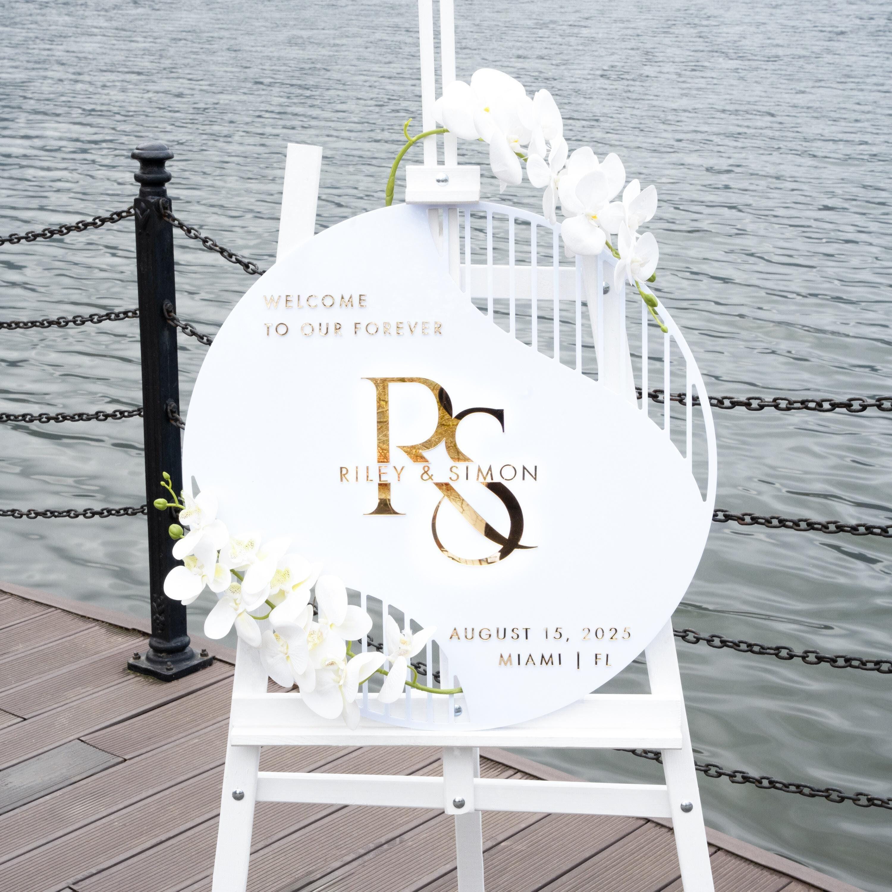 boho elegant round white wedding welcome sign with 3D cut out gold mirror text.