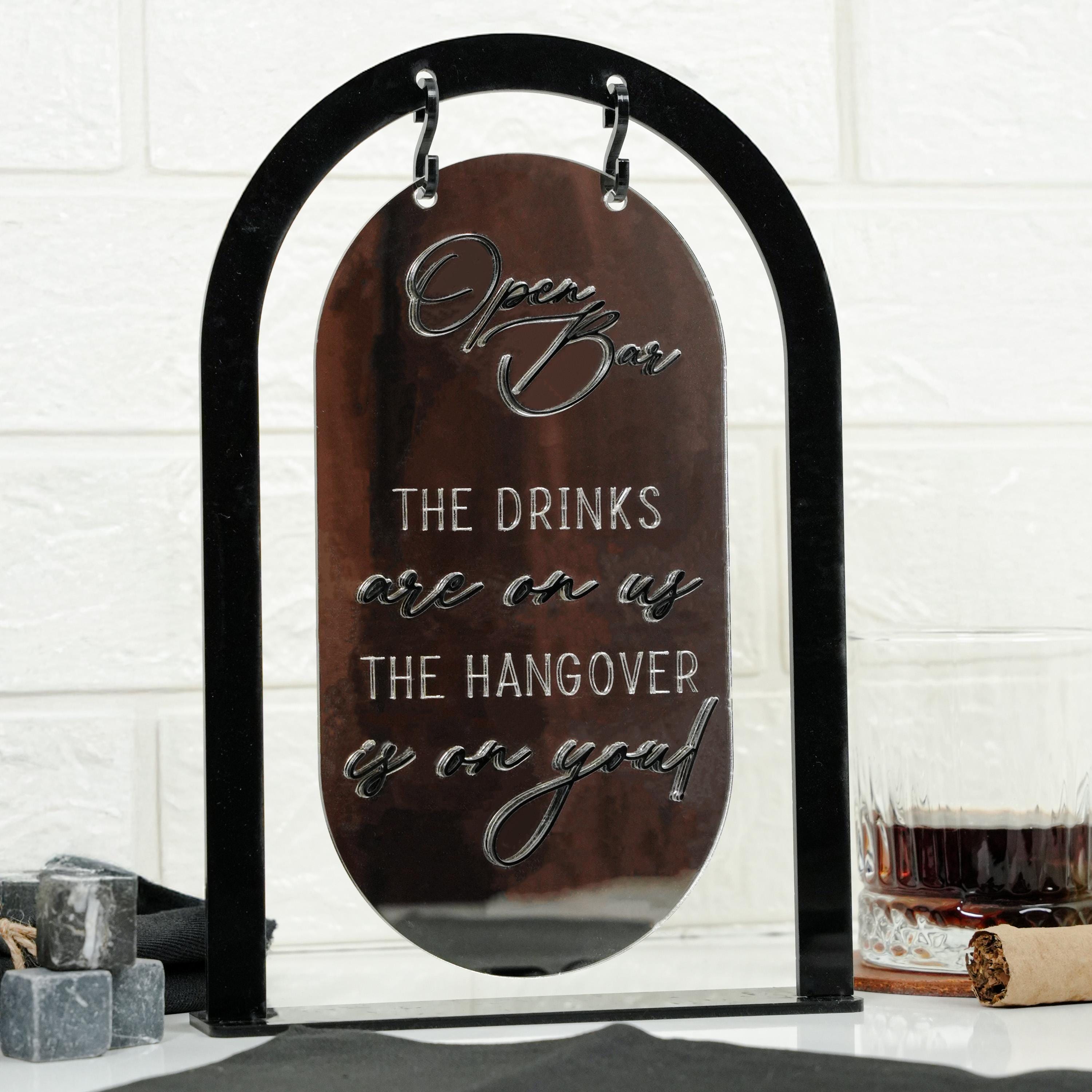 a wooden plaque with a quote on it