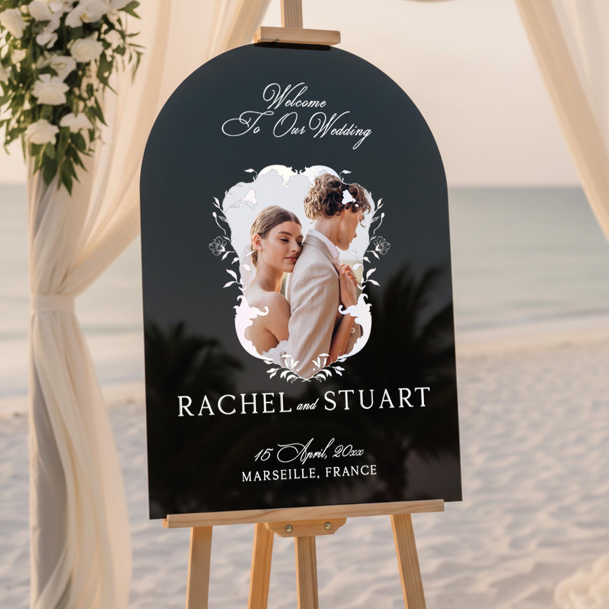 The image is a wedding invitation featuring a couple embracing in a romantic pose, with the names "RACHEL and STUART" and the date "15 April, 2017" displayed prominently.