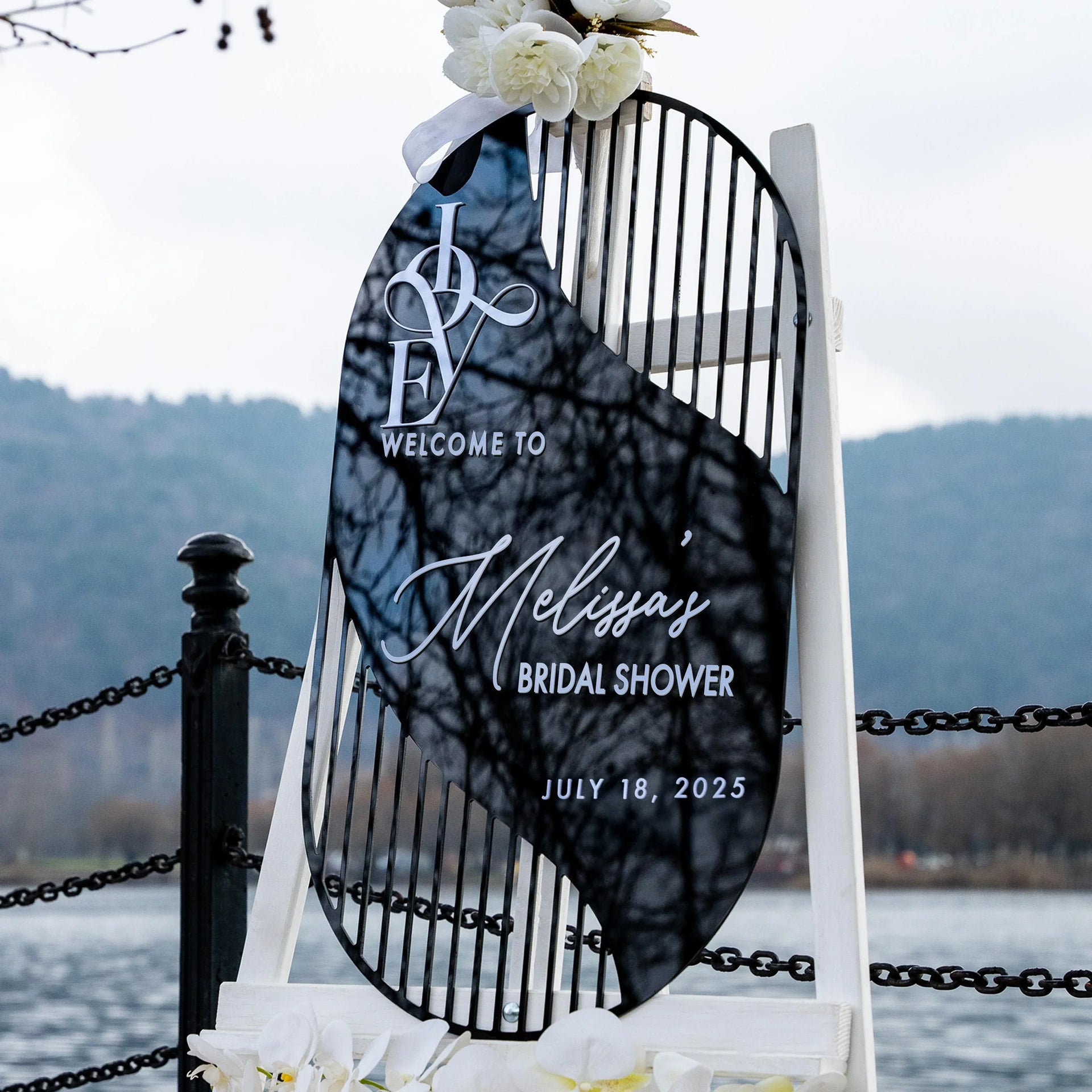 Arch acrylic bridal shower welcome sign with floral styling