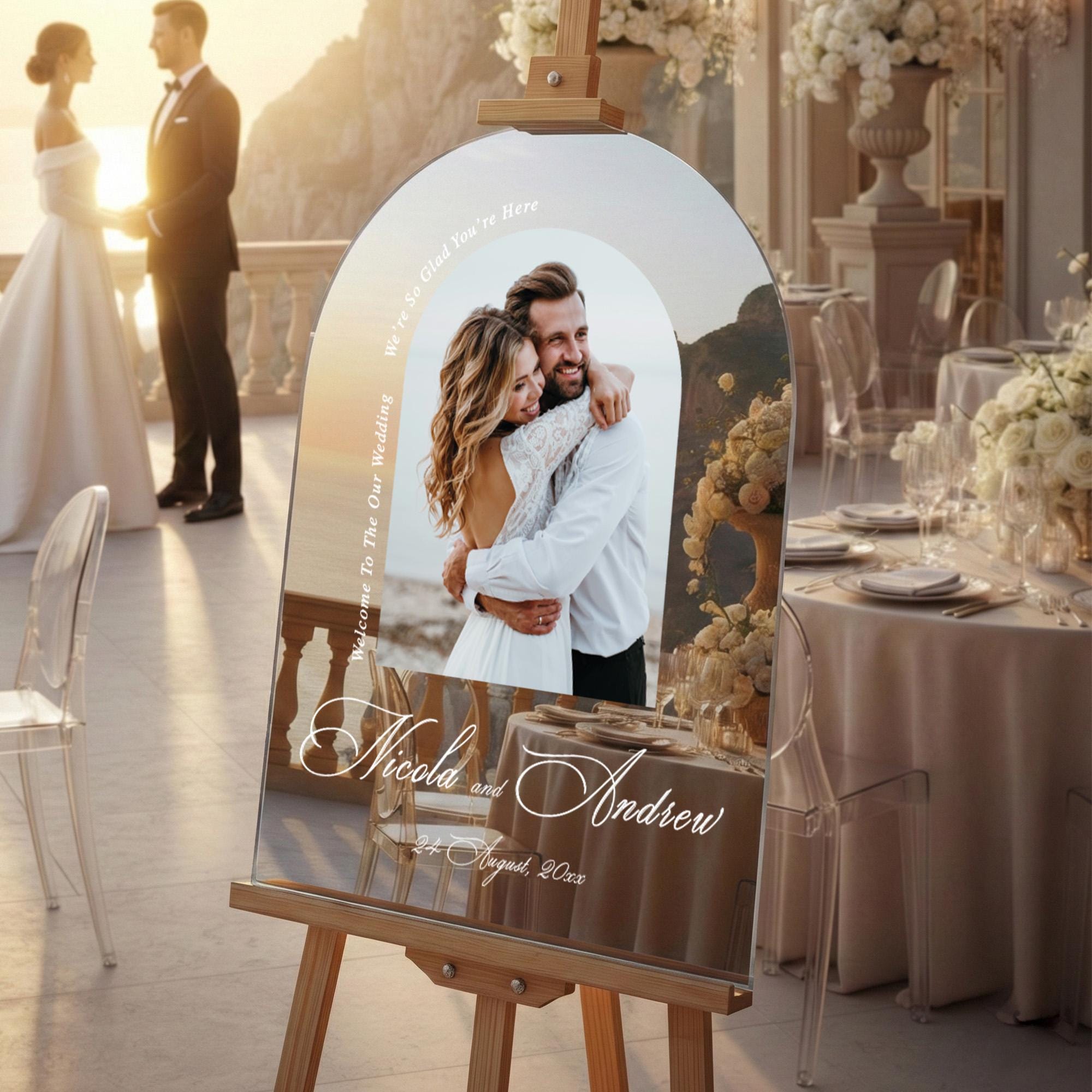 a wedding invitation with a couple embracing in the center, surrounded by a scenic backdrop.
