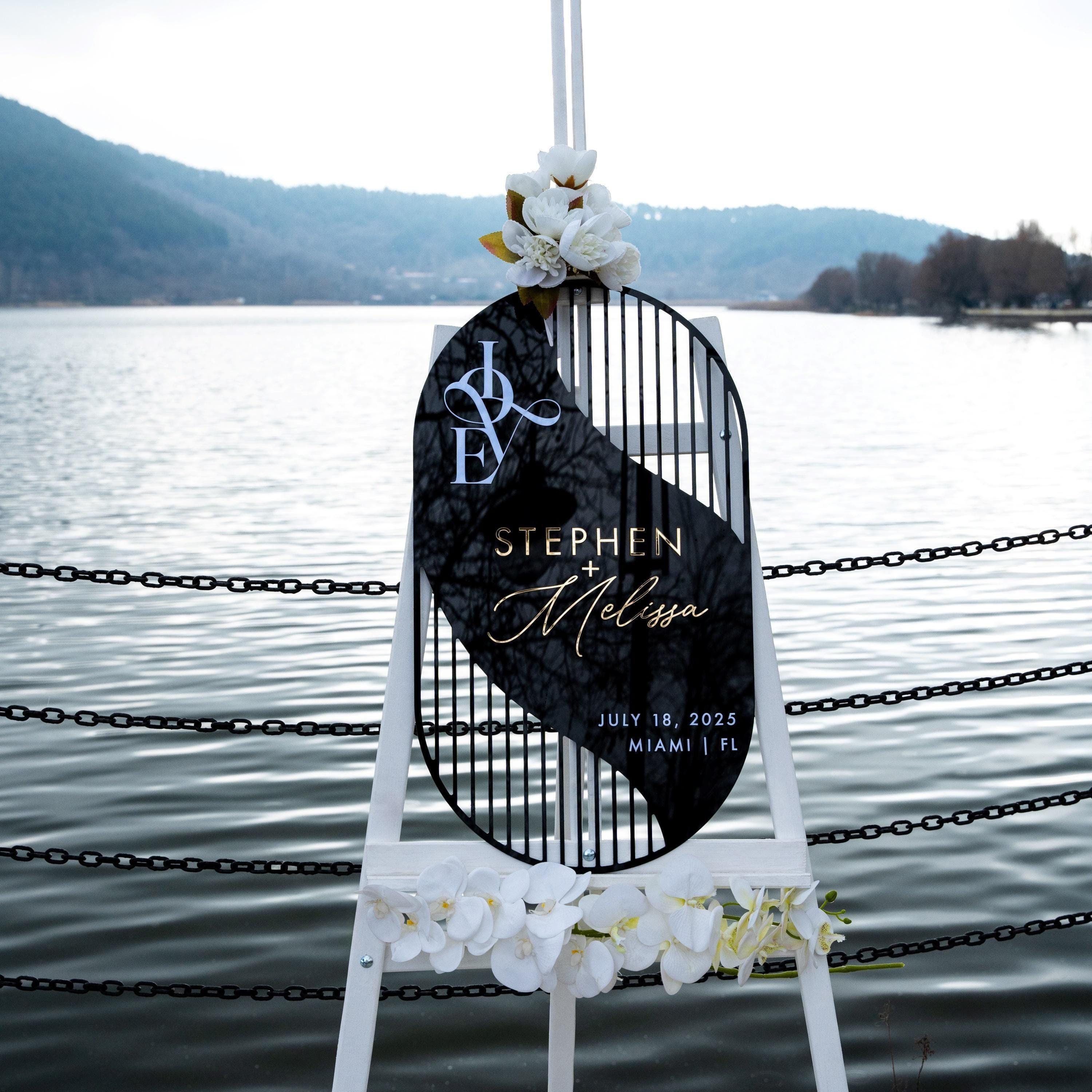 boho elegant wedding welcome sign with 3D cut out gold mirrorand white text.