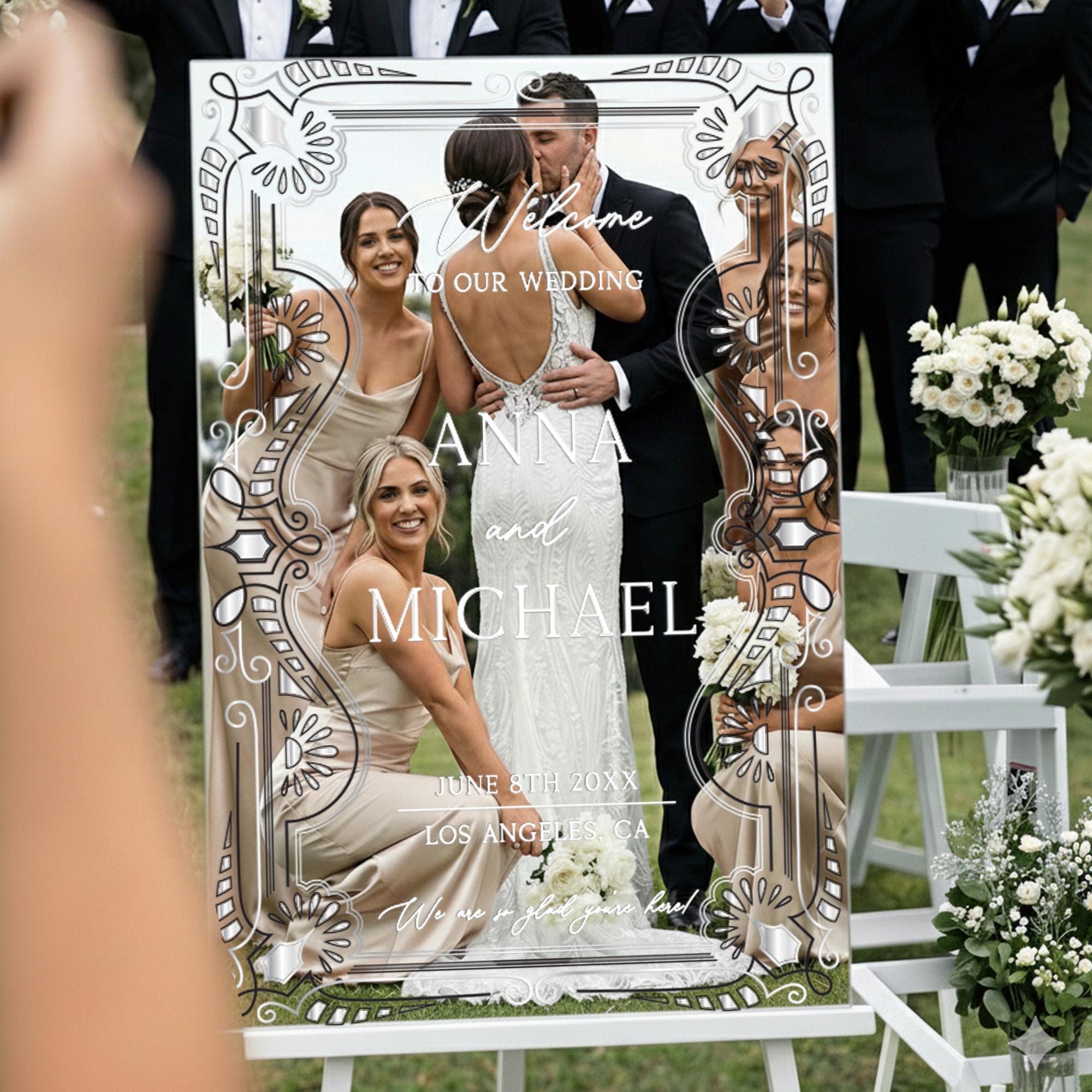 a wedding invitation with a bride and groom kissing in the background, surrounded by their wedding party and guests.