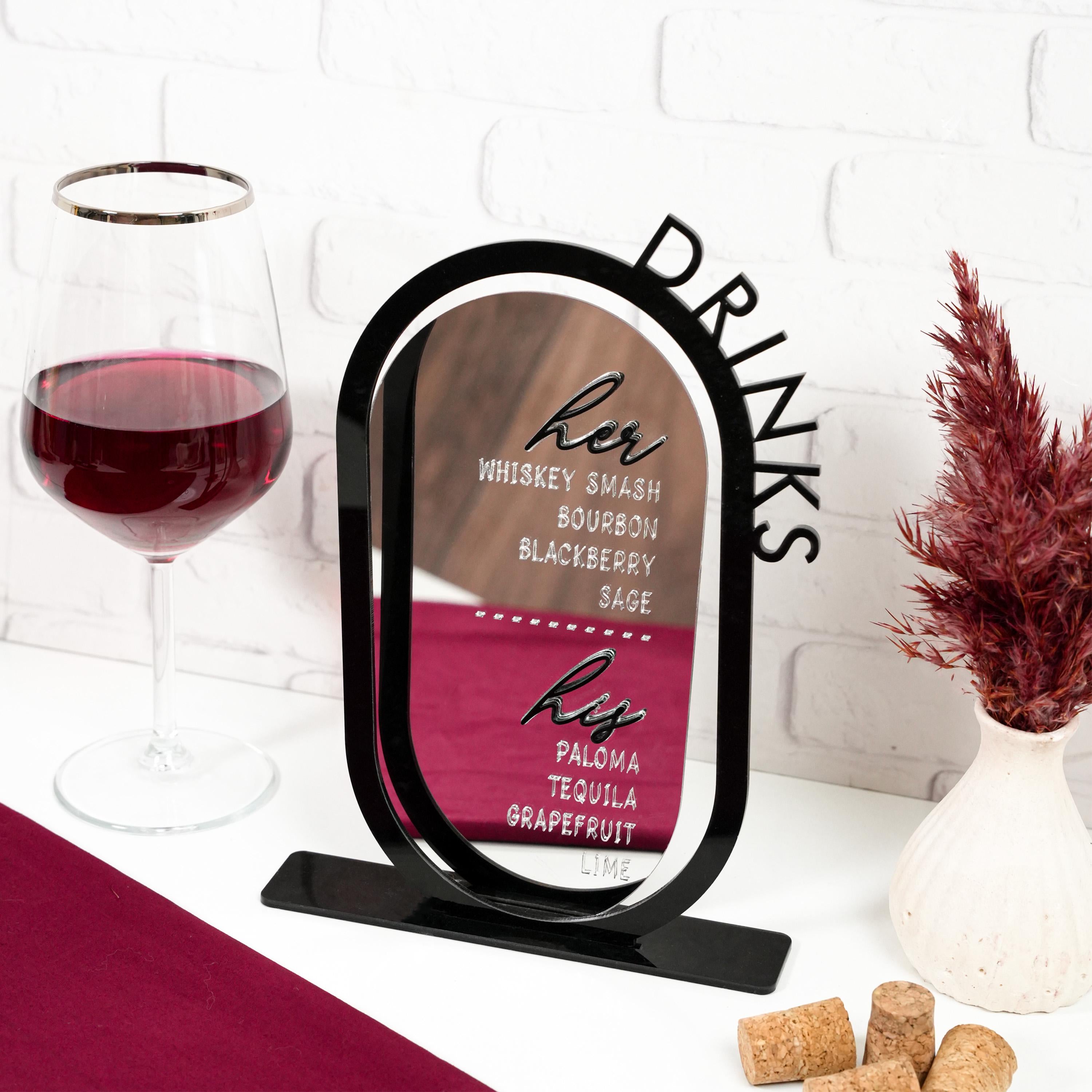 a wine glass and a wine bottle on a table