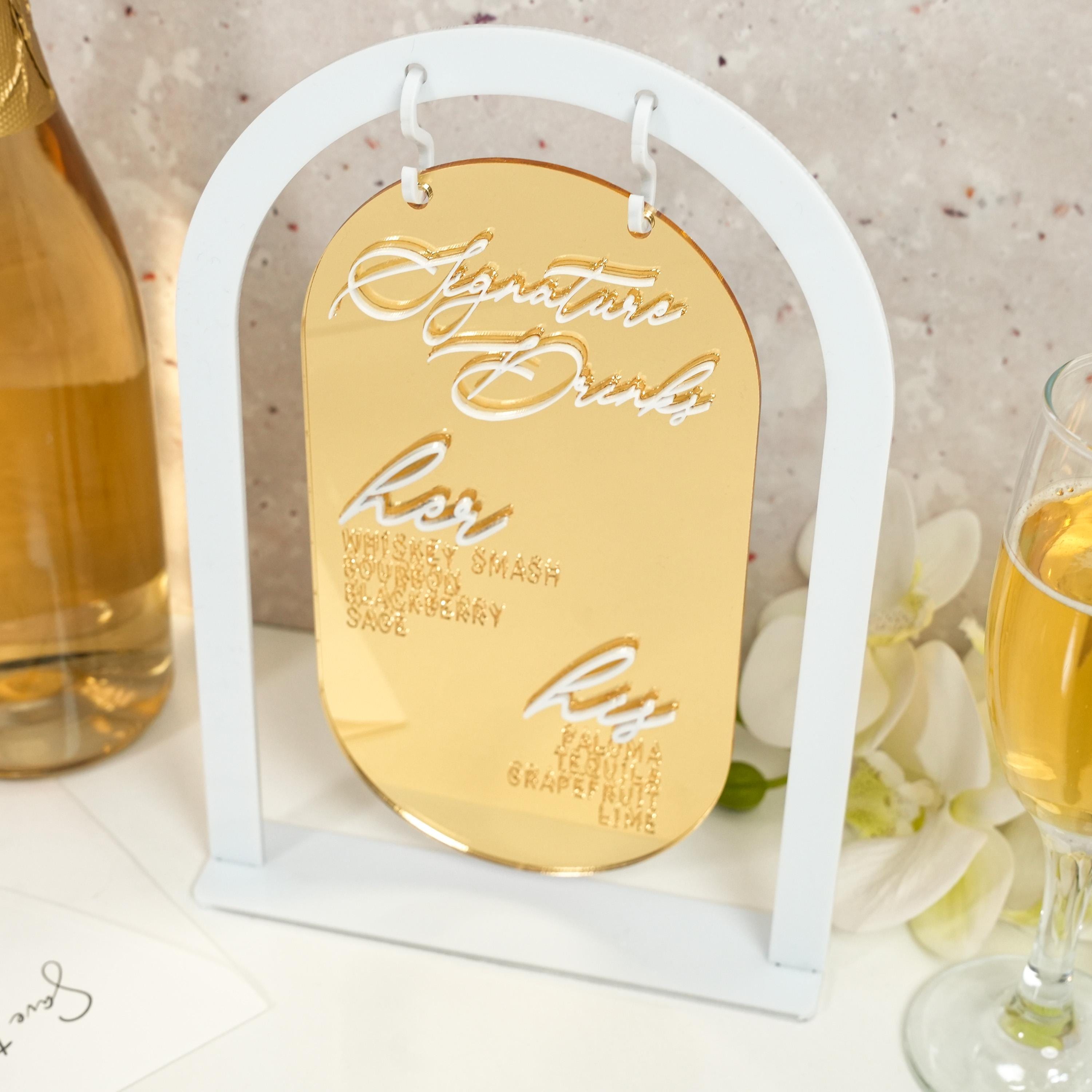 a bottle of champagne and a glass of wine