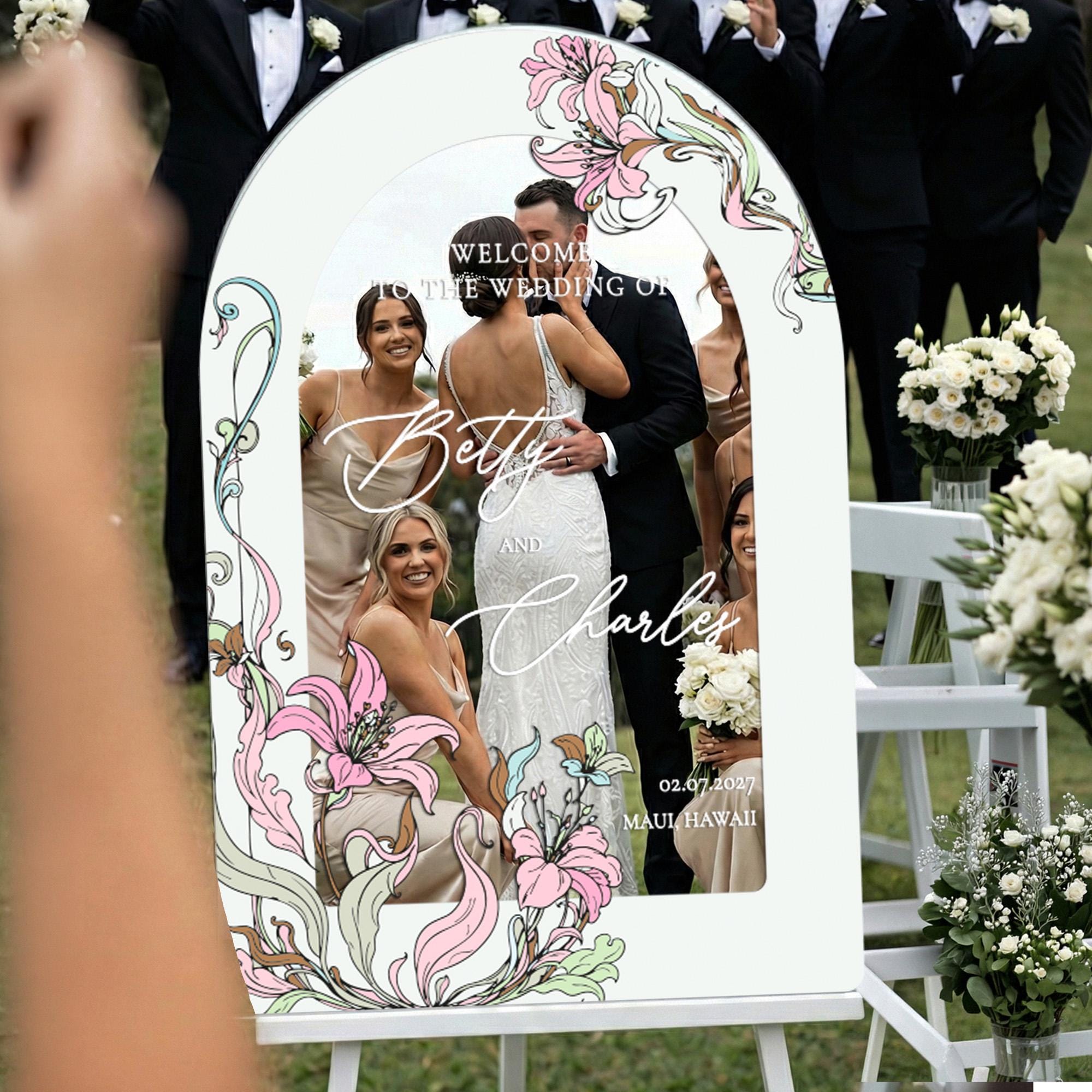 a wedding invitation with a couple embracing in the center, surrounded by their wedding party and guests.