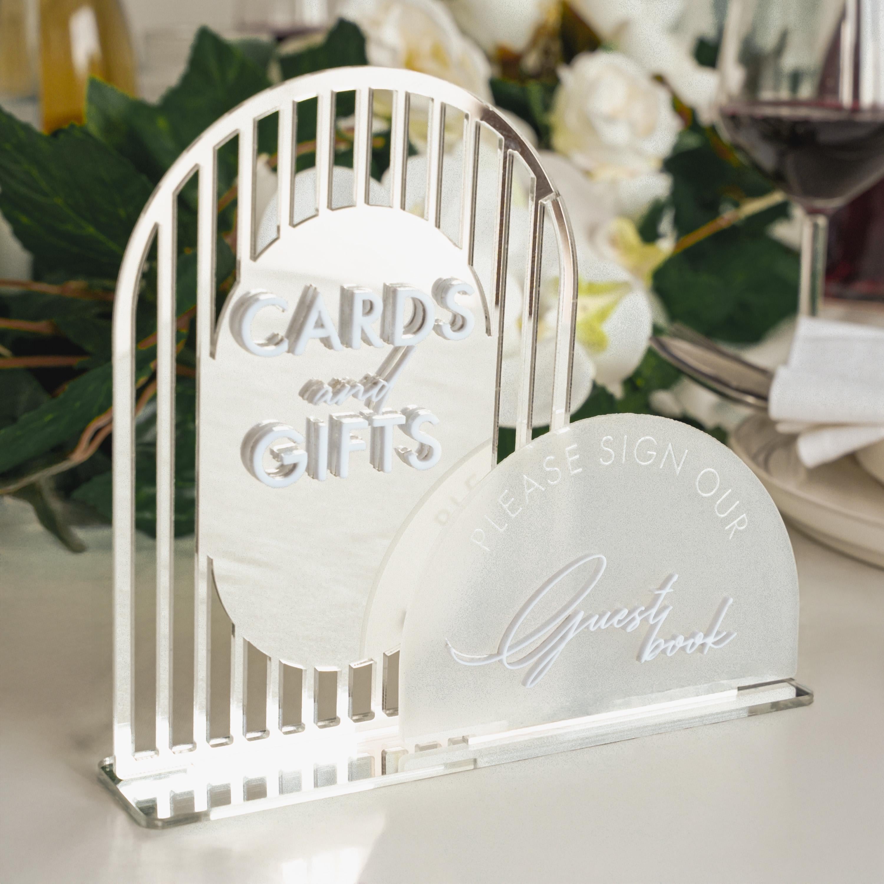 a couple of white plates sitting on top of a table