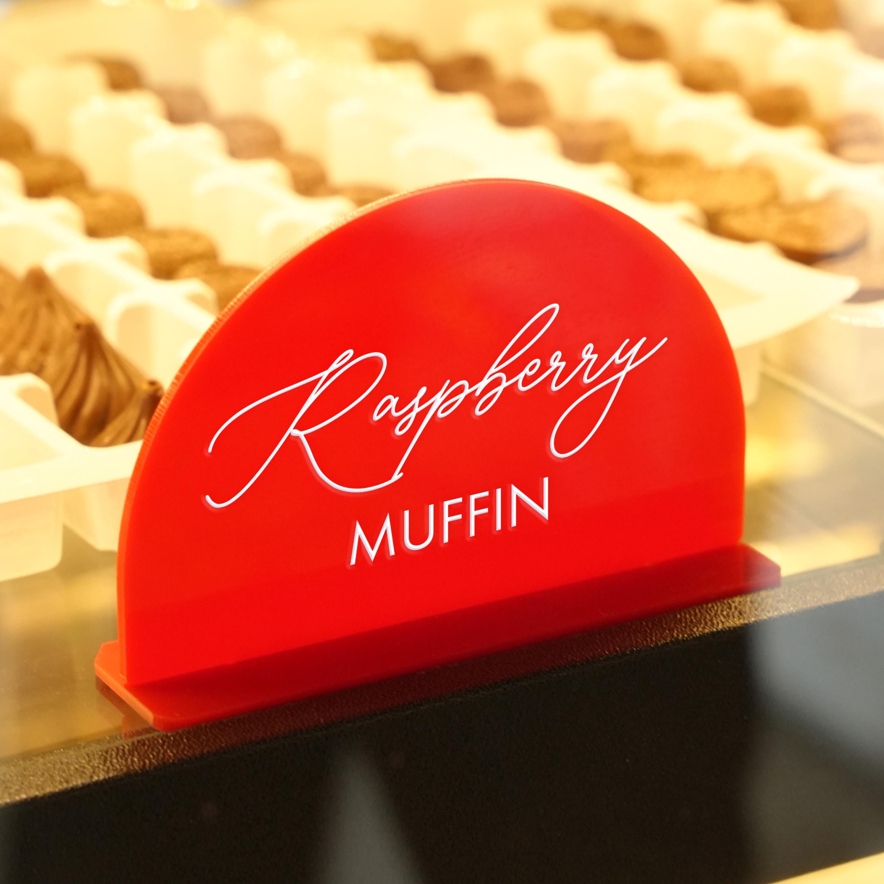 a close up of a plate of muffins on a table