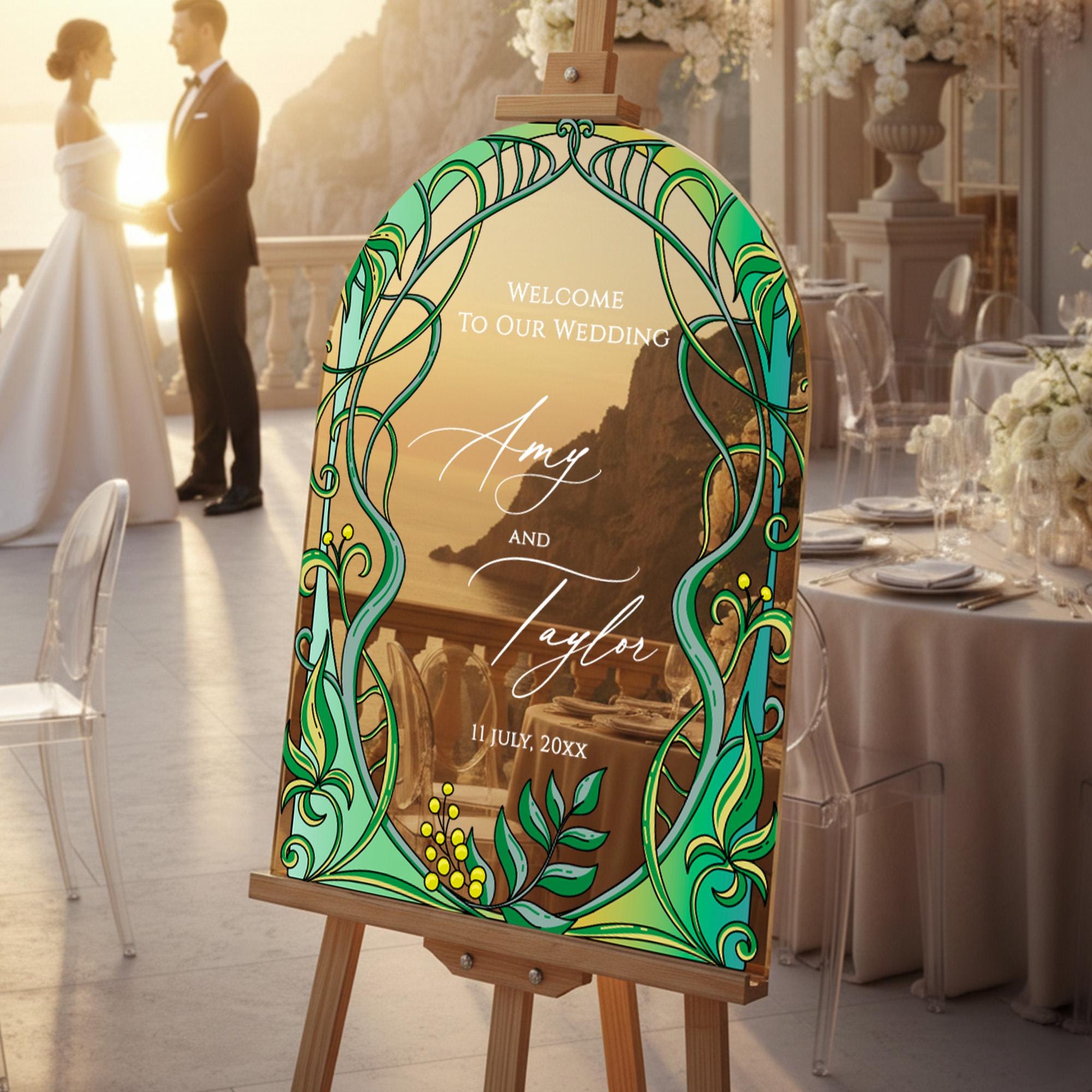 a wedding invitation with a couple's names, Amy and Taylor, and the date of their wedding, 11 July 20XX. The wedding is taking place at a seaside location, as indicated by the presence of a scenic backdrop.