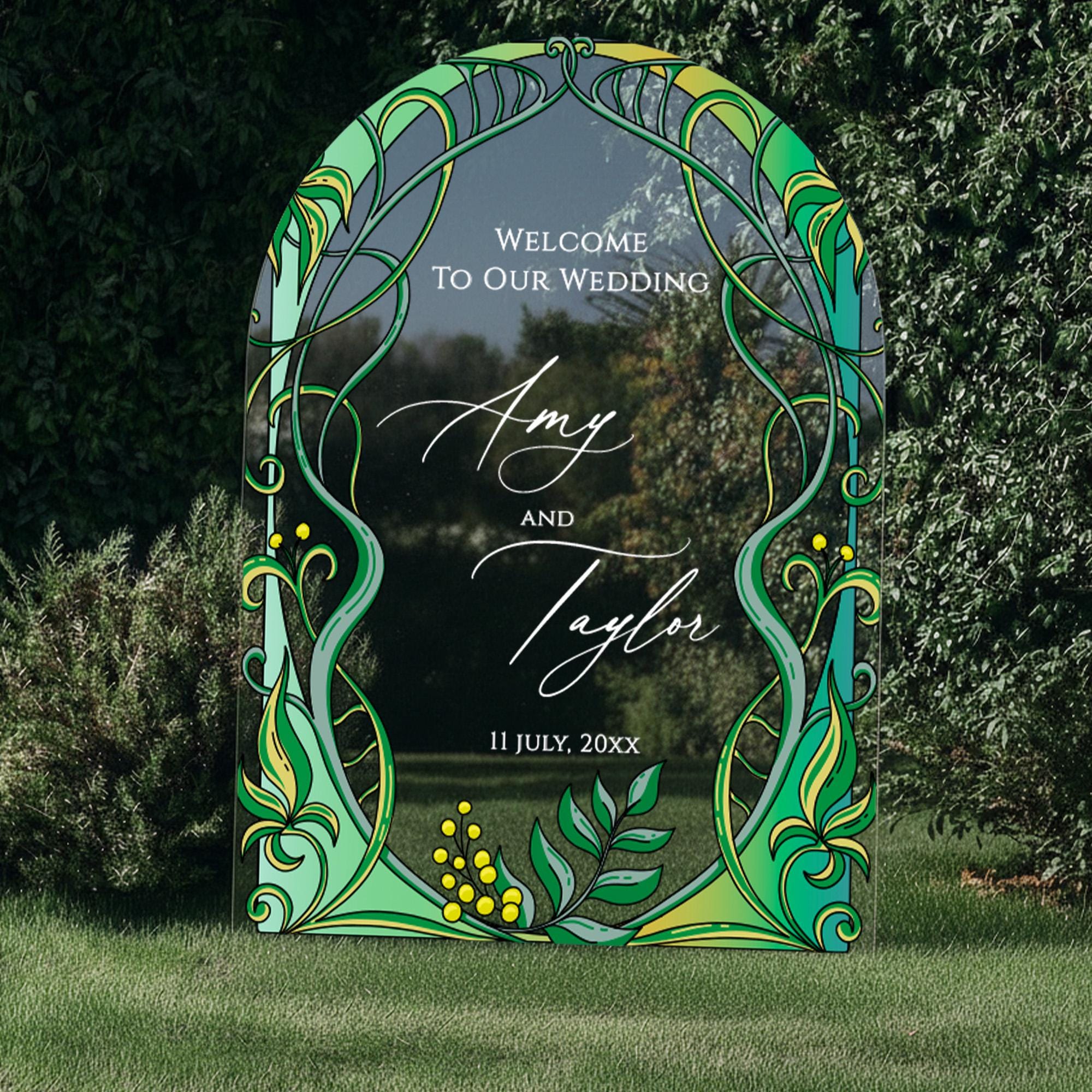 a large, colorful sign with a floral design and the text "Welcome to Our Wedding Amy and Taylor 11 JULY, 20XX" displayed on it.