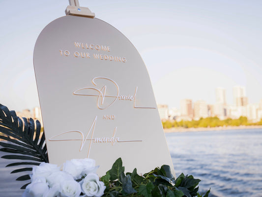 Custom Gold Mirror Acrylic Wedding Sign on stand with wedding white roses and flowers